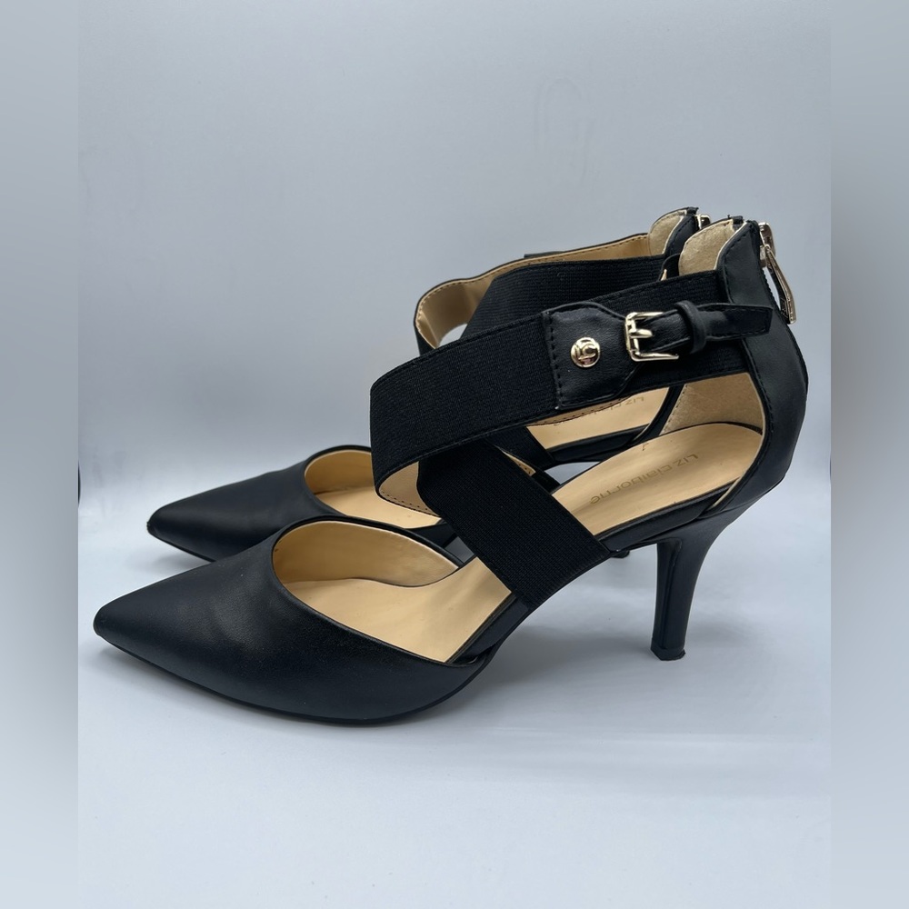 Liz Claiborne black pointed pump with cross cross straps.